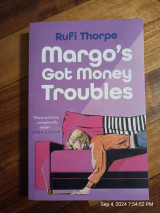 Margot's got money trouble